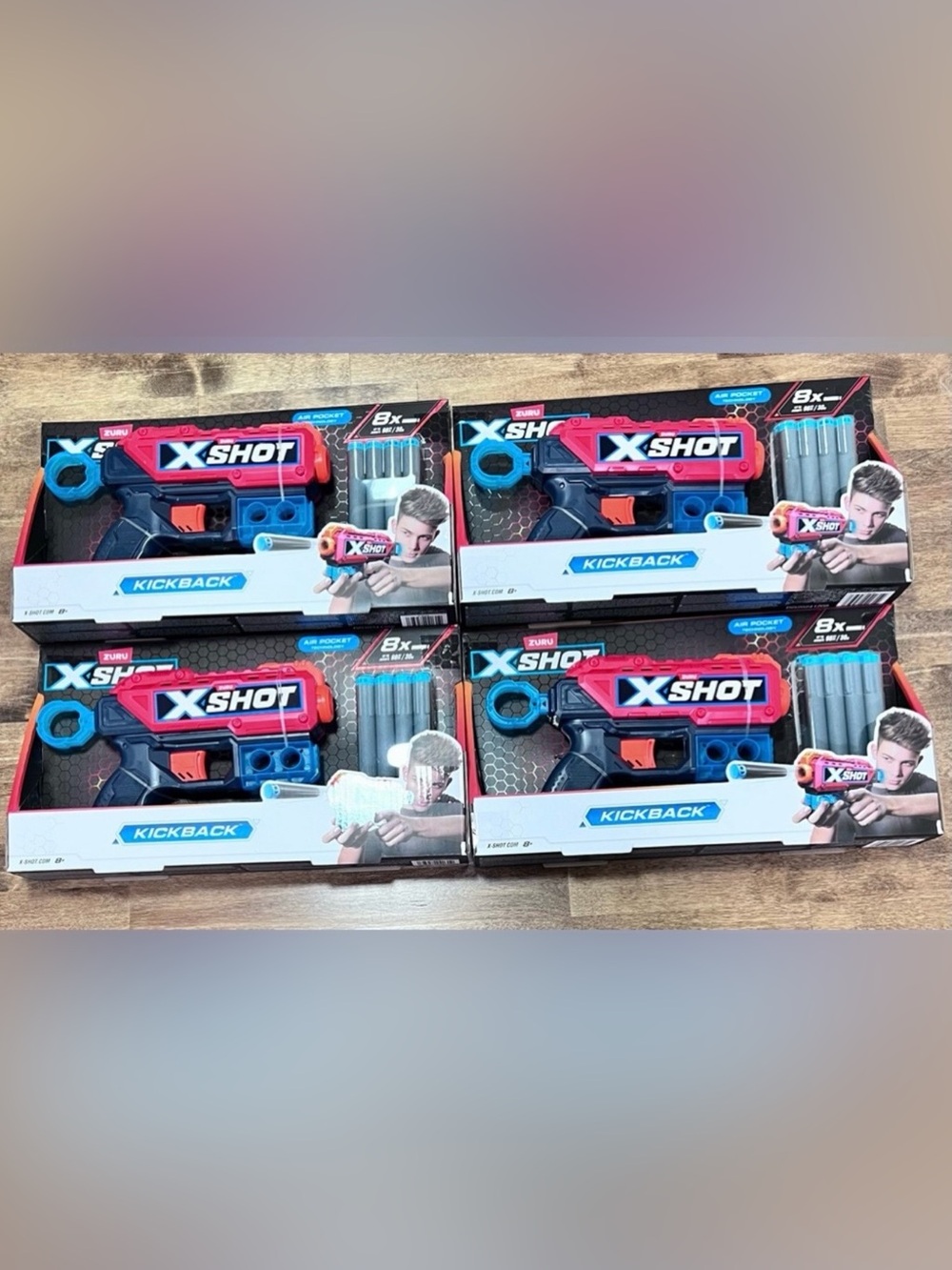X-Shot Kickback Foam Dart Blaster – Pink and Blue